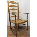 Georgian ashwood ladder back elbow chair, the solid seat on turned supports