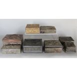 A diverse collection of Chinese silver metal, copper and gilt metal trinket and cigarette boxes (8)