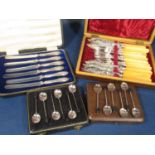 A collection of cased silver flatware comprising a good set of Victorian silver bladed fish knives