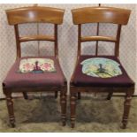 A set of six Victorian mahogany bar back dining chairs with drop in upholstered seats raised on