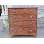 A Georgian mahogany stained pine sided bedroom chest of four long graduated drawers raised on