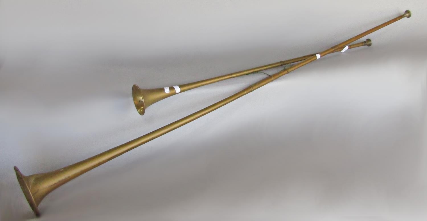 Brassware: a pair of turned brass candlesticks, shell casing, three coaching horns by Alfred May, - Image 2 of 2
