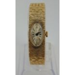 Vintage 9ct ladies dress watch with textured strap, maker 'Gr', London 1972, 26.7g gross