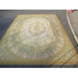 Massive French Aubusson type country house carpet with typical decoration of roses upon a khaki