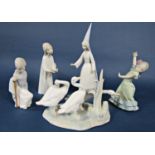A collection of Lladro figure groups including three geese, a young witch, a girl with chamber