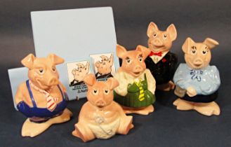 A set of five Wade Natwest pig money banks together with a Piggy Bank paying in book and a Piggy