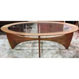 A G plan teak Astro coffee table of oval form with inset glass top and moulded supports, 122 cm (4ft