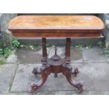 A mid-Victorian period walnut and figured walnut foldover top card table with floral marquetry