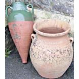 A weathered terracotta oviform jar with simple moulded loop handle and ribbed body, 46 cm high,