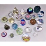 A collection of twenty two paperweights to include millefiori examples and others