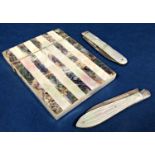 Two antique silver and mother-of-pearl folding fruit knives to include one with fluted baluster