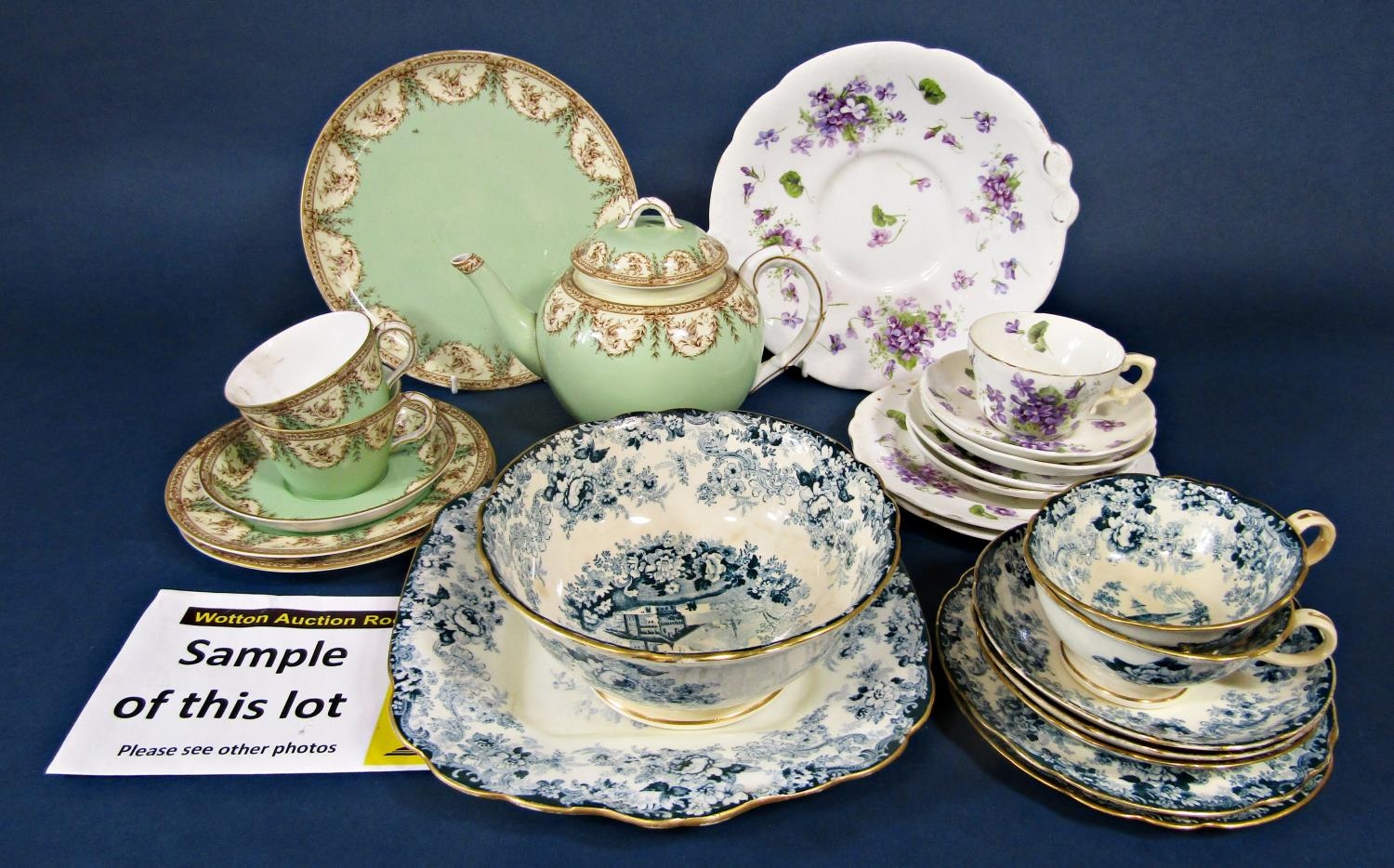 A collection of late 19th century Minton tea wares with alpine style decoration comprising cake