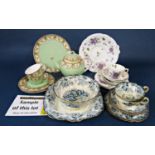 A collection of late 19th century Minton tea wares with alpine style decoration comprising cake