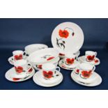 A collection of Wedgwood Susie Cooper design Cornpoppy pattern wares comprising five dinner