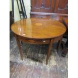 A pair of Georgian mahogany D end side tables, the central marquetry panels set within string banded