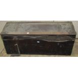 A 19th century domed topped travelling trunk, partially leather clad with wooden timber lathes and