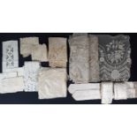 A box of 19th century lace remnants including 2 lengths of veil type lace with applique work over