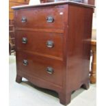 An Edwardian mahogany chest of three deep drawers on swept supports with brass plate handles, 76