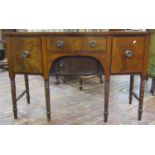 A small Regency mahogany bowfronted sideboard enclosed by three drawers and a central sliding