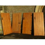 Nine reclaimed stained pine internal doors, varying sizes and styles