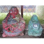 Two small reclaimed garden ornaments in the form of seated buddha with painted finish, varying size,