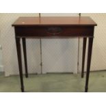 A Jaycee reproduction mahogany writing table with hinged lid enclosing a simply fitted interior