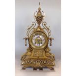 Good quality French brass drum head mantel clock, the worked brass dial fitted with enamel
