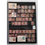 A stock book containing a large quantity of Penny Red stamps, two small leaflets also containing