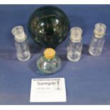 Three glass buoys, small collection of bottles with stoppers, etc