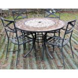 A contemporary light steel garden terrace suite comprising a table of circular form with mosaic