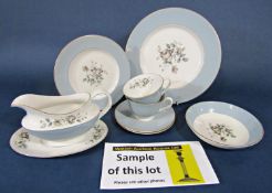 A collection of Royal Doulton Rose Elegans dinner and teawares including an oval meat plate, sauce