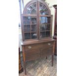 An inlaid mahogany Edwardian side cabinet, raised on square tapering supports, the lower section