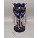 Late 19th century blue glass lustre with gilt and enamelled overlay, 37cm high (some drops vacant)