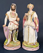 A pair of 19th century continental bisque figures of medieval style male and female characters, he