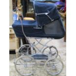 A Genlein Original Panorama pram with sprung frame, wire spoke wheels and hard rubber tyres