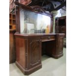 A good quality Victorian mahogany shallow inverted breakfront pedestal sideboard with raised