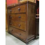 A Victorian mahogany bedroom chest of two short over three long graduated drawers, with oak