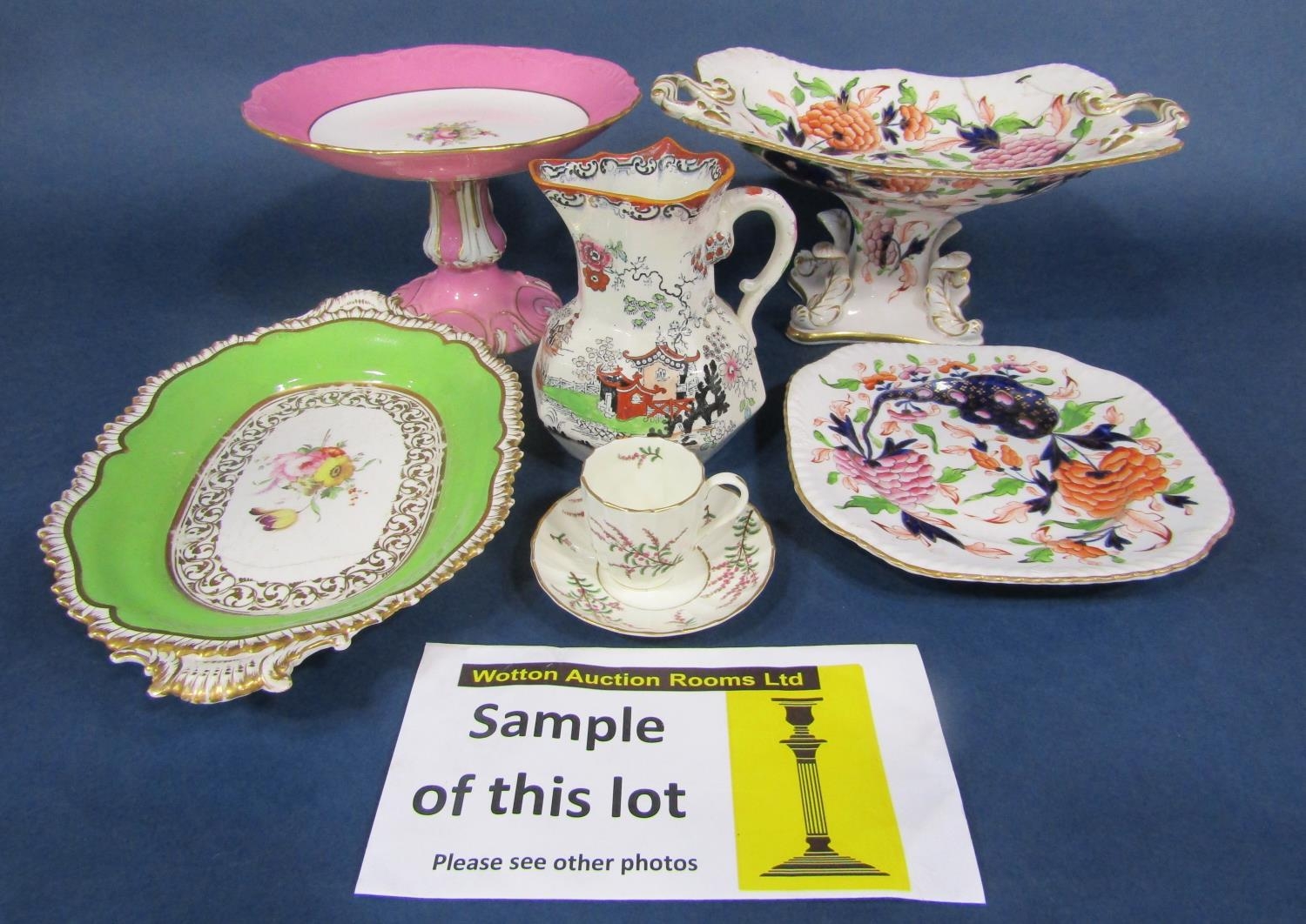A collection of early 19th century dessert wares with painted and gilded decoration in the