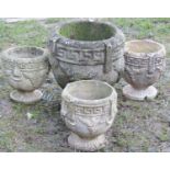 A reclaimed classical style circular garden urn with Greek key and grape detail, 37cm diameter x