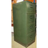 A vintage floorstanding steel four drawer filing cabinet in original green painted colourway with