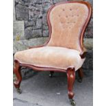 A Victorian spoonback ladies drawing room/nursing chair with serpentine upholstered seat and