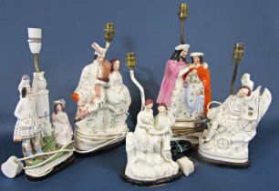 A collection of five 19th century Staffordshire figure groups converted to table lamp bases