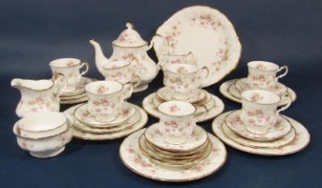 A collection of Paragon Victorian Rose pattern tea wares comprising tea pot (af) cake plate, milk