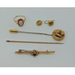 Group of yellow metal items to include a bar brooch, cameo ring (cut), Scottish style buckle stick