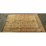 Good quality antique Tabriz carpet with typical scrolled foliate decoration upon an ivory ground