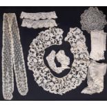 Collection of 19th century hand-made lace items including a large collar, cuffs, lappets, fichu ec