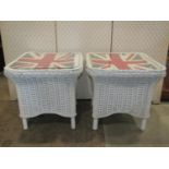 A pair of contemporary cream painted wicker occasional tables with shaped outline, loose union