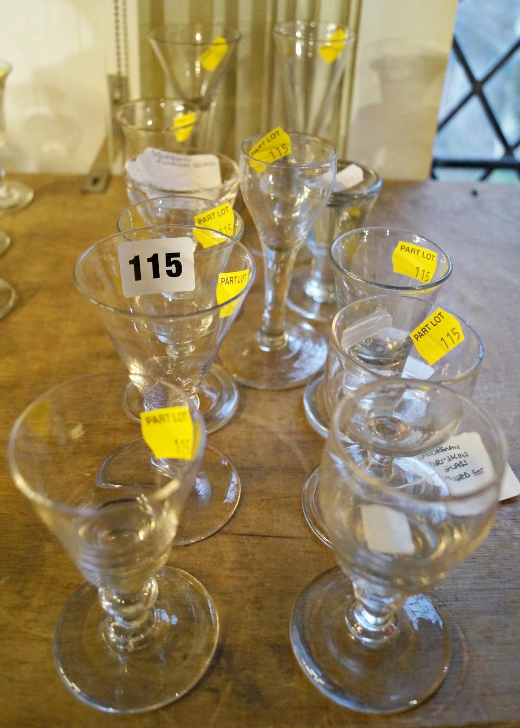 A collection of thirteen Georgian drinking glasses including illusion glasses, stemmed wine glasses, - Image 2 of 2