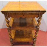 Mid-Victorian period satin walnut centre table of square cut form on three tiers with repeating