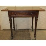 A Victorian mahogany writing table, the overhanging rectangular top with moulded outline and inset
